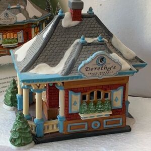 Department 56 Dorothy skate rental building